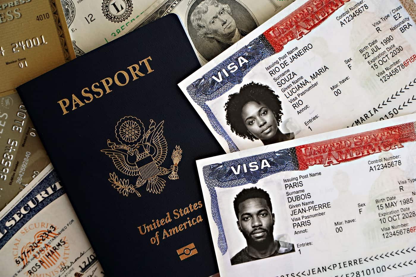 A U.S. passport lying with travel papers and currency